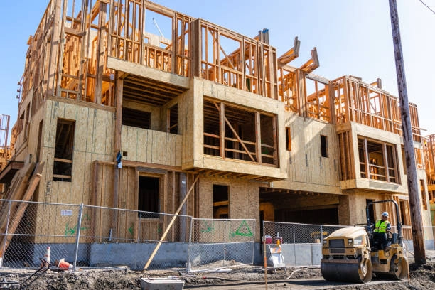 house under construction with wood on top and Compact Rollers -general construction san jose