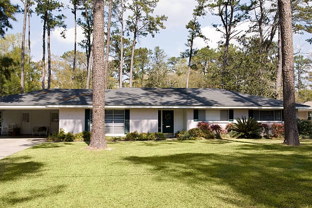 ranch style house outdoor view with tree trunks -ranch style home additions