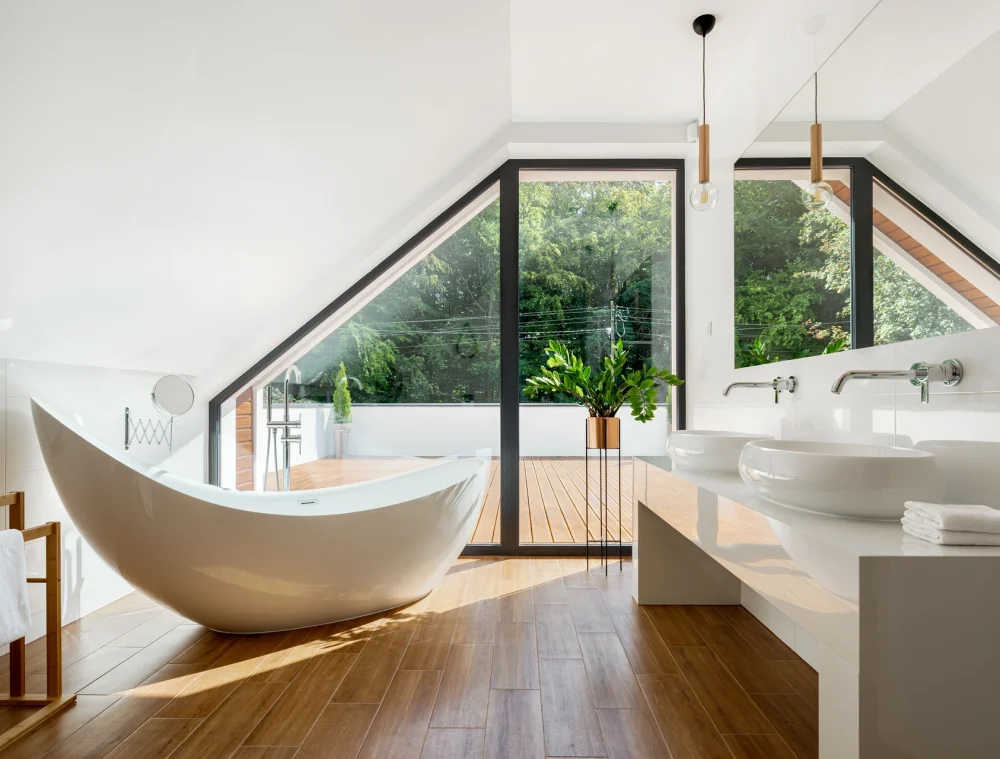 modern, minimalist bathroom with a large window view.
